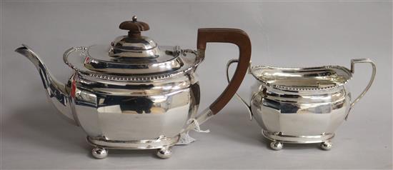 A silver two-piece tea service, comprising teapot and sucrier, approx 32oz gross